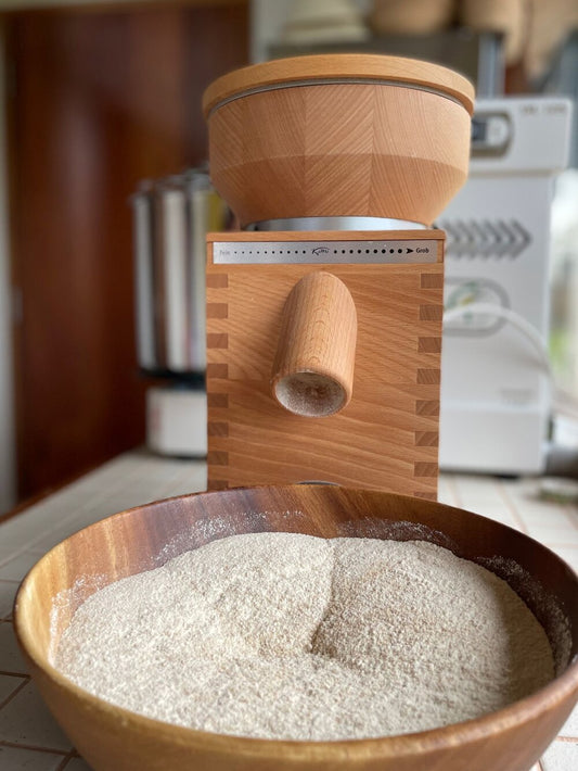 Milling wheat grain into flour for bread making